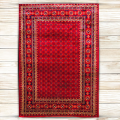 Vibrant Traditions: Bold Red Ornamental Rug